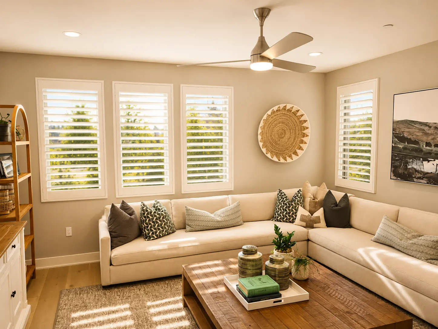 White plantation shutters in a coastal-style family room
