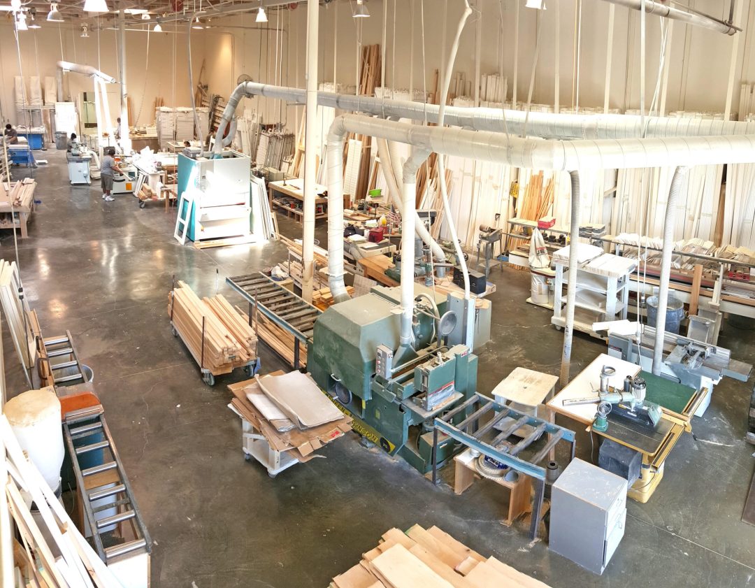 Manufacturing floor with North American basswood being milled